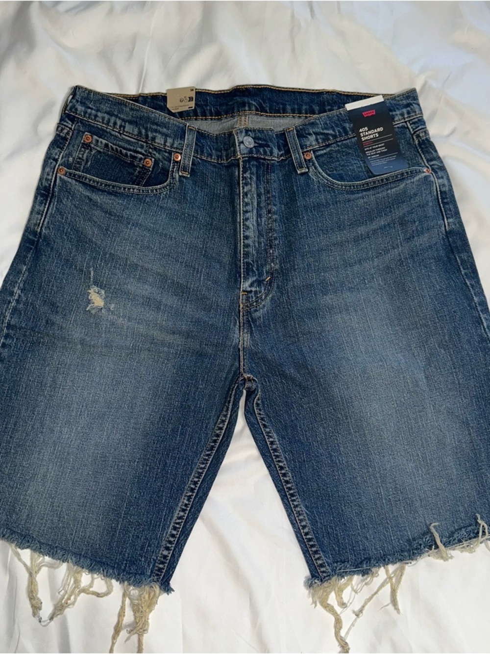 Levi's Dark Blue Distressed Denim Cutoff Shorts